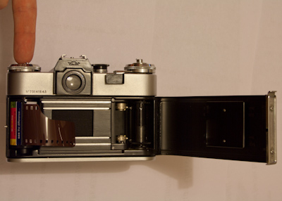 Loading a film into a Zenit E SLR camera