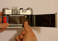 Loading a film into a Zenit E SLR camera